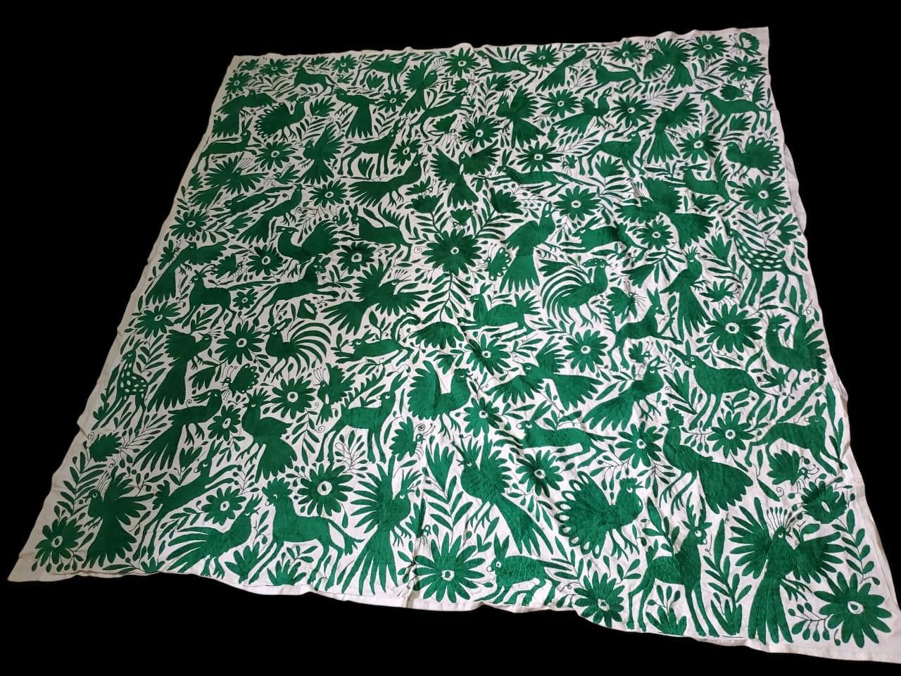 Extra large all green Otomi tapestry wall art hand-embroidered in Mexico, depicting nature and animals.