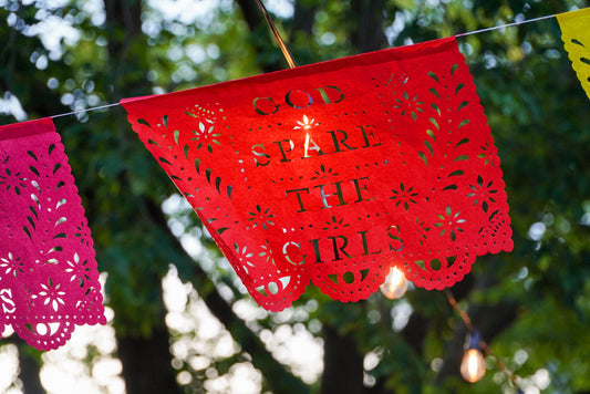 Red papel picado, cutout text