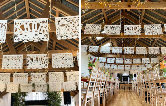 white mexican wedding flags; chairs and tables