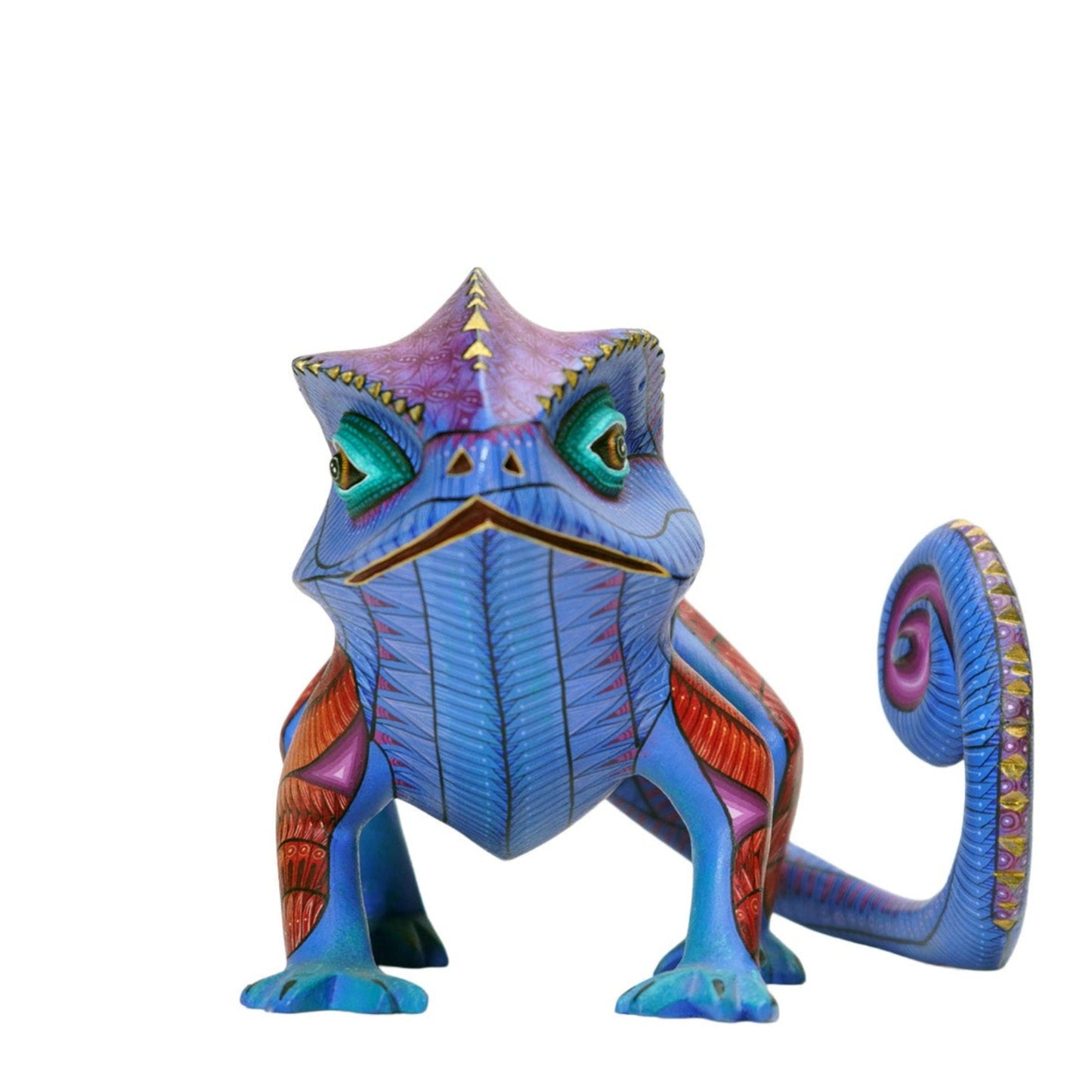 Colorful chamelion figurine with detailed design on a white background. Mexican alebrije.
