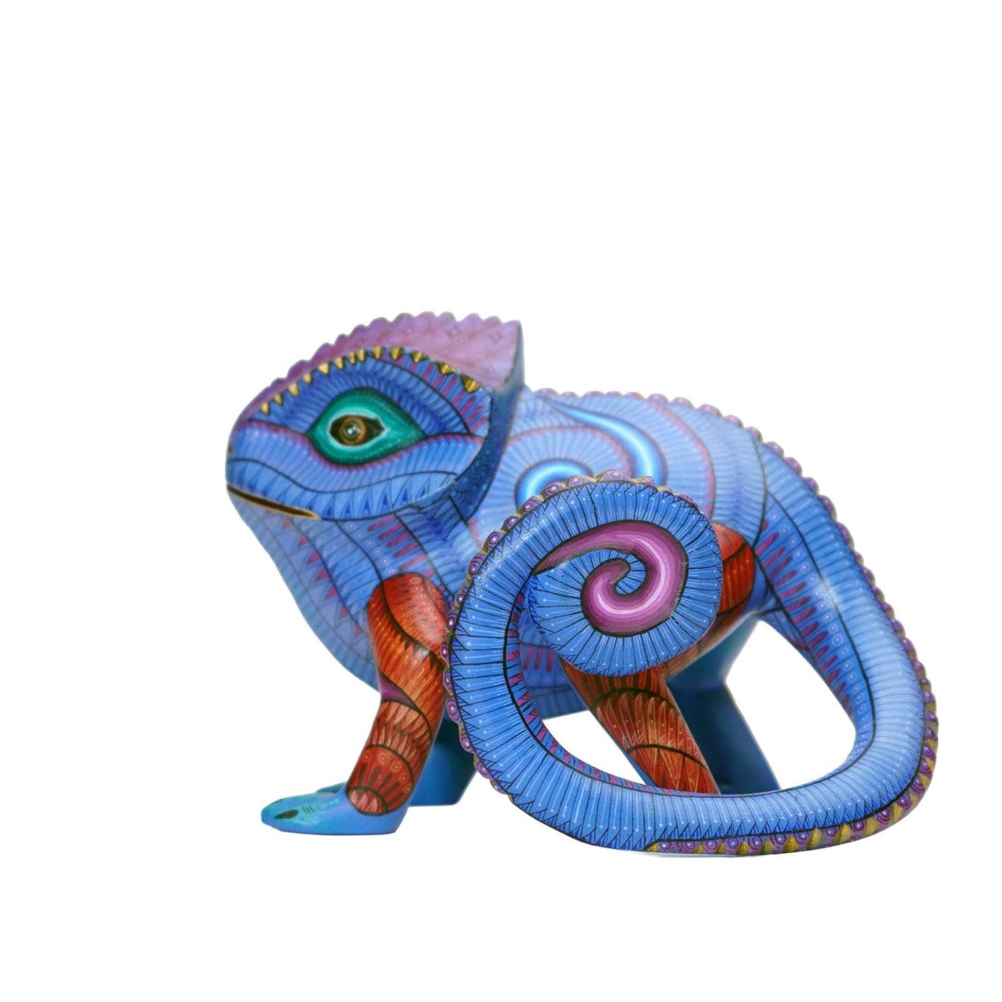 Colorful chamelion figurine with detailed design on a white background. Mexican alebrije.