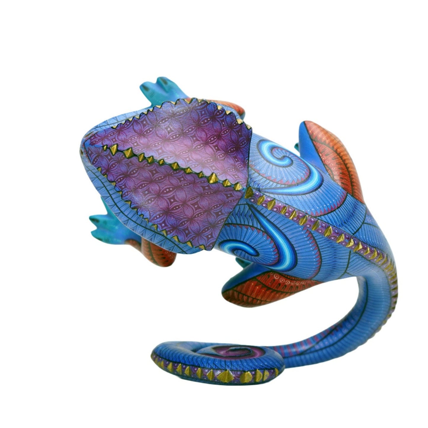 Colorful wooden lizard sculpture, from above, on a white background. Very detailed painted design.