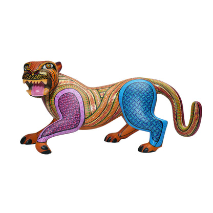 Colourful alebrije of a jaguar sculpture with intricate hand-painted patterns, on a white background.