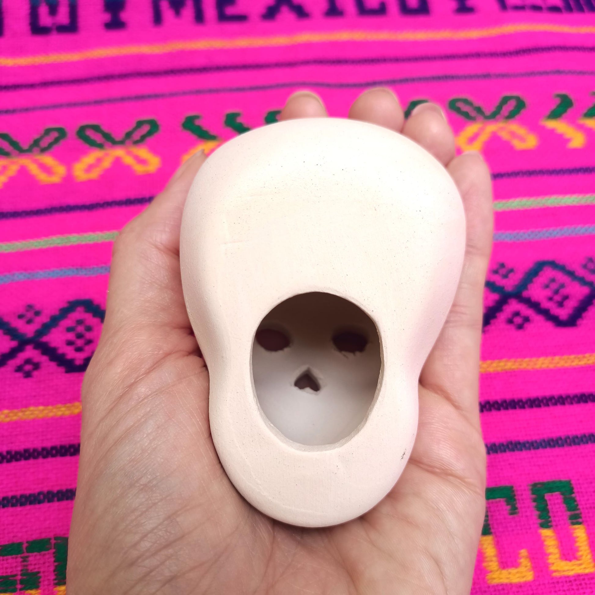 ceramic sugar skulls to paint, underneath