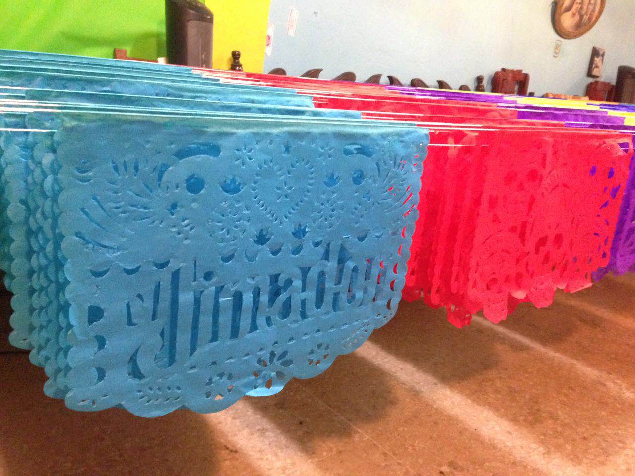 custom papel picado tissue paper bunting hanging to dry