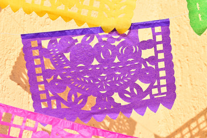 Mexican Colourful Paper Banner close up of purple flag with fruit basket