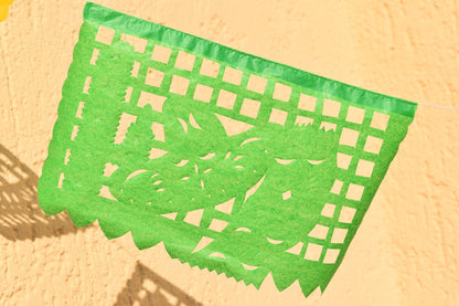 green papel picado paper flag