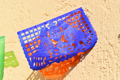 blue and orange papel picado paper flags