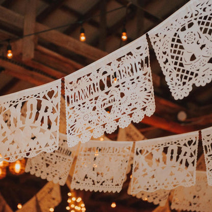 personalised white papel picado wedding bunting with couple's names