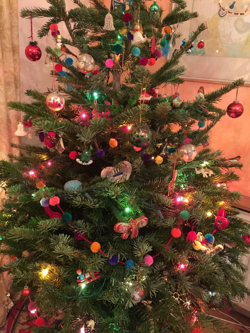 pom pom garland for christmas tree up close